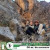 Persona escalando una vía ferrata en las montañas de Cusco, Perú.